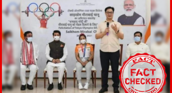ALTERED IMAGE: मीराबाई चानू के बधाई समारोह में दिवार पर लगे पोस्टर में उनके रजत पदक दिलवाने के लिए प्रधानमंत्री मोदी को धन्यवाद करने का बैनर एडिटेड है।