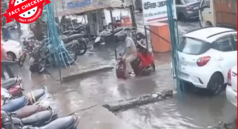 बारिश के पानी से भरे गड्ढें में गिरे दंपित का वीडियो यूपी का है, दिल्ली का नहीं।